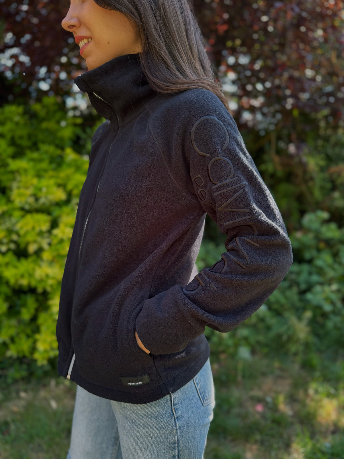 Stay warm in style with the Calvin Klein Performance Embroidered Full Zip Fleece Jacket in classic black.
Crafted for comfort and designed for performance, this high-quality fleece jacket features premium embroidered branding, a full front zip closure, and a sleek silhouette ideal for layering. Whether you're heading to the gym, running errands, or lounging on chilly days, this versatile jacket delivers modern, sporty elegance with the trusted quality of Calvin Klein.