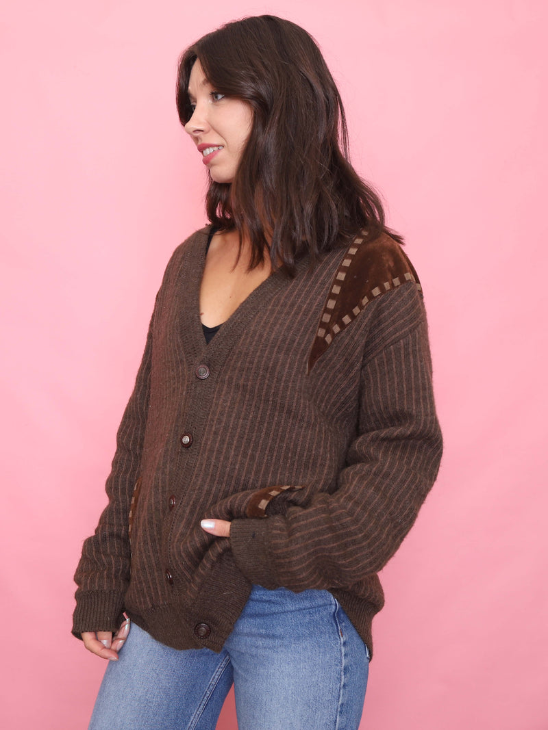 model wearing 90s vintage brown cardigan with suede geometric shoulder detailing

