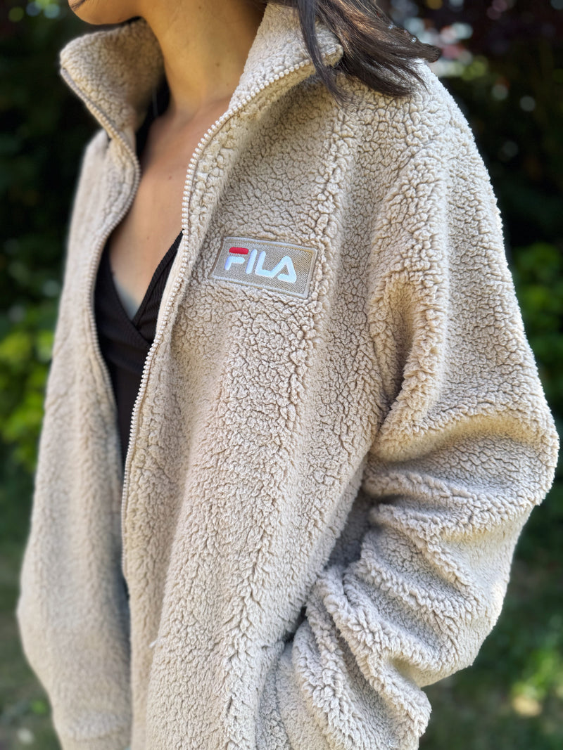 Fila vintage teddy fleece jacket with full zip. Soft borg texture for cozy retro streetwear and winter warmth.