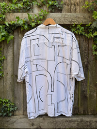 Retro Abstract Line Art Shirt | White & Black Geometric Pattern Short Sleeve