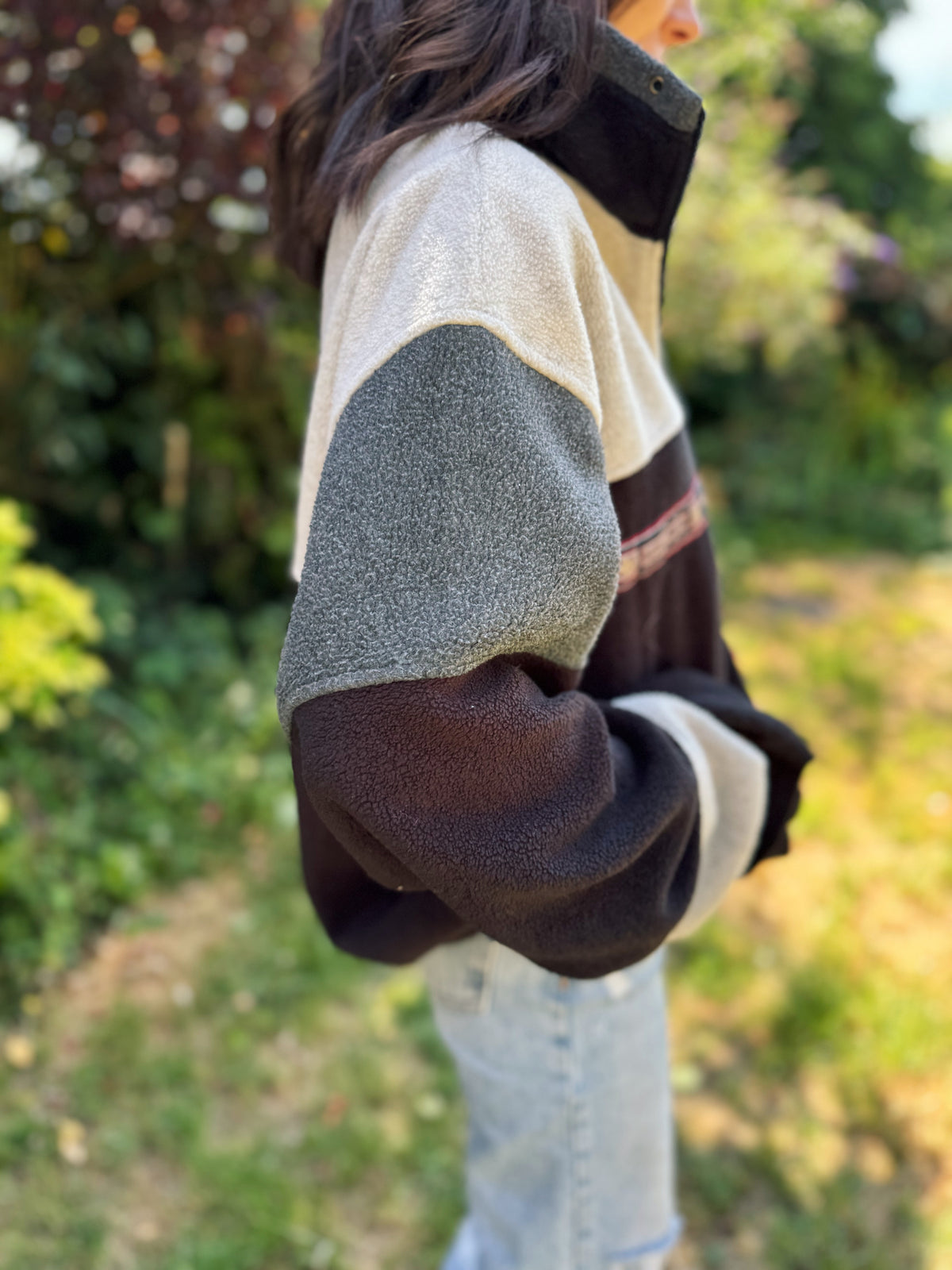 Vintage black and grey 1/4 zip fleece pullover with retro activewear tape design