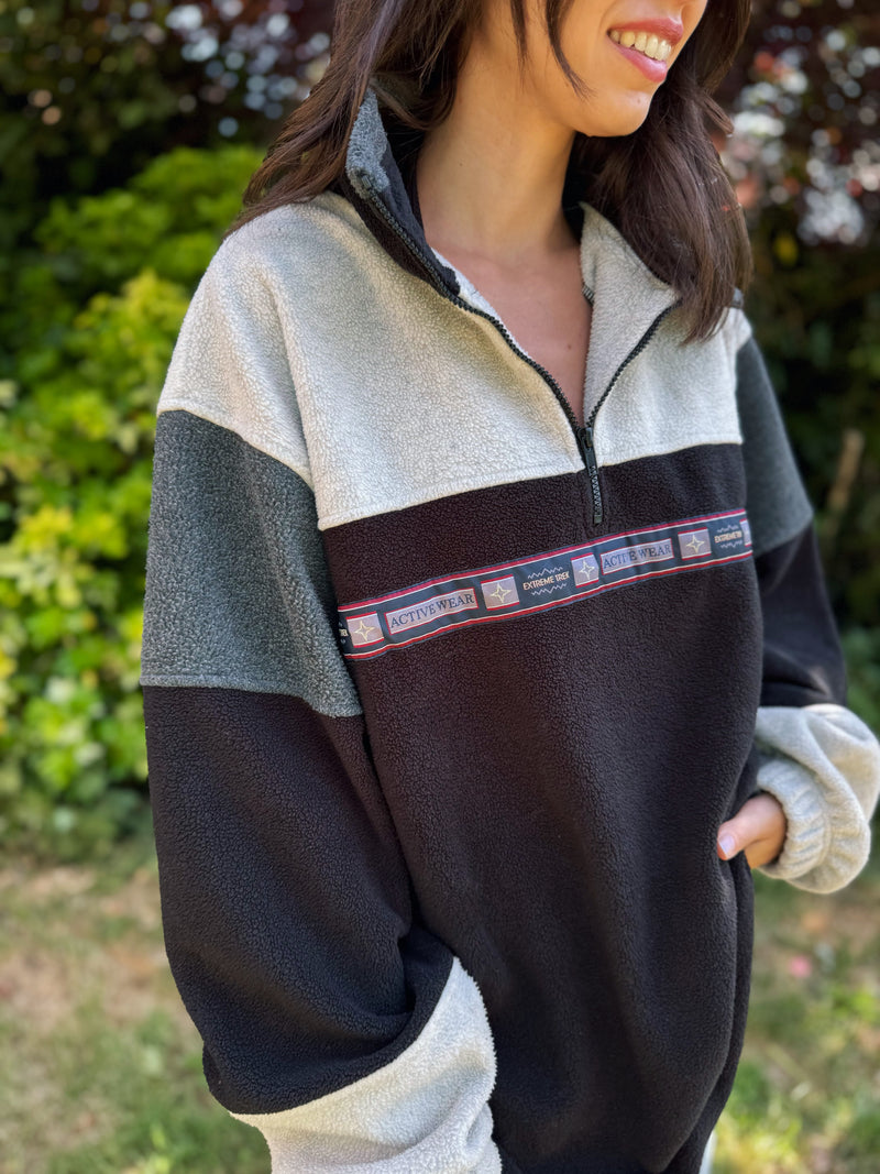 Vintage black and grey 1/4 zip fleece pullover with retro activewear tape design