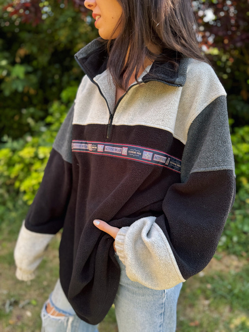 Vintage black and grey 1/4 zip fleece pullover with retro activewear tape design