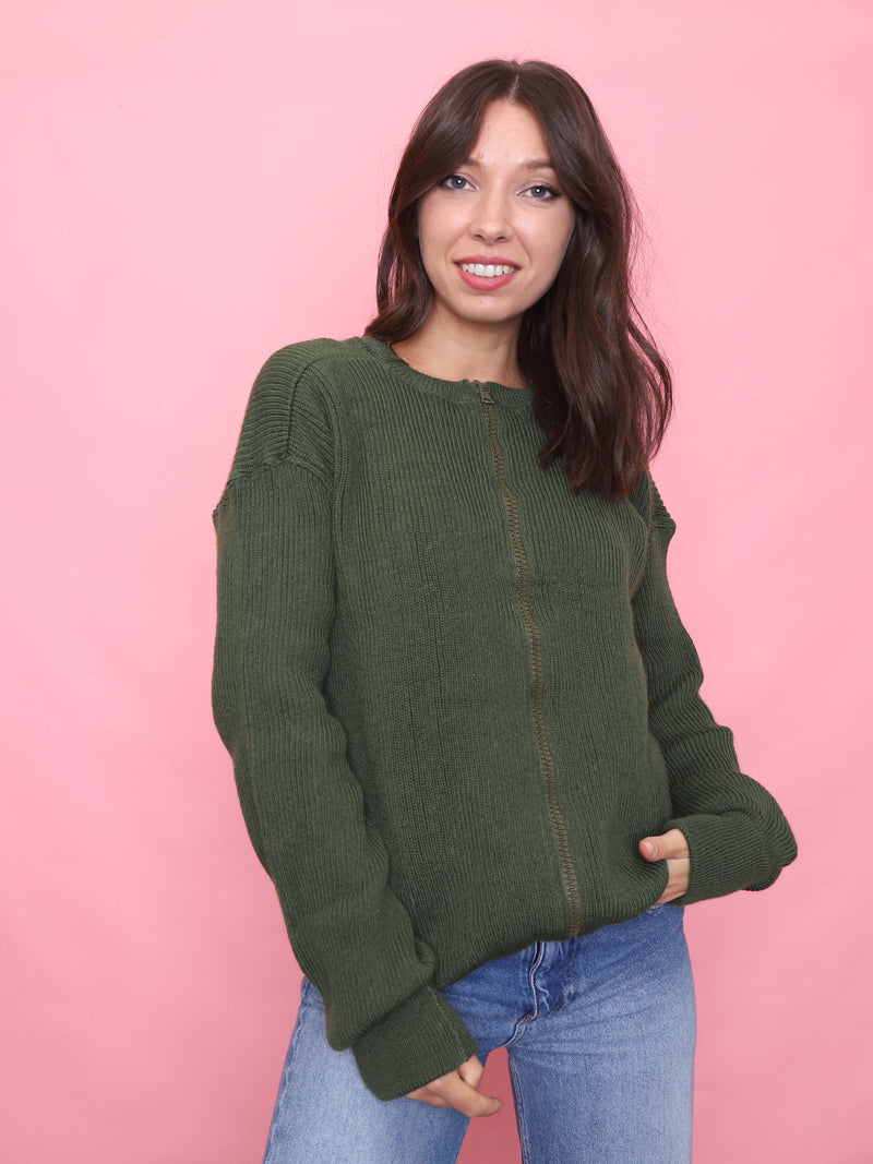Model wearing vintage olive green zip-up ribbed knit cardigan front view

