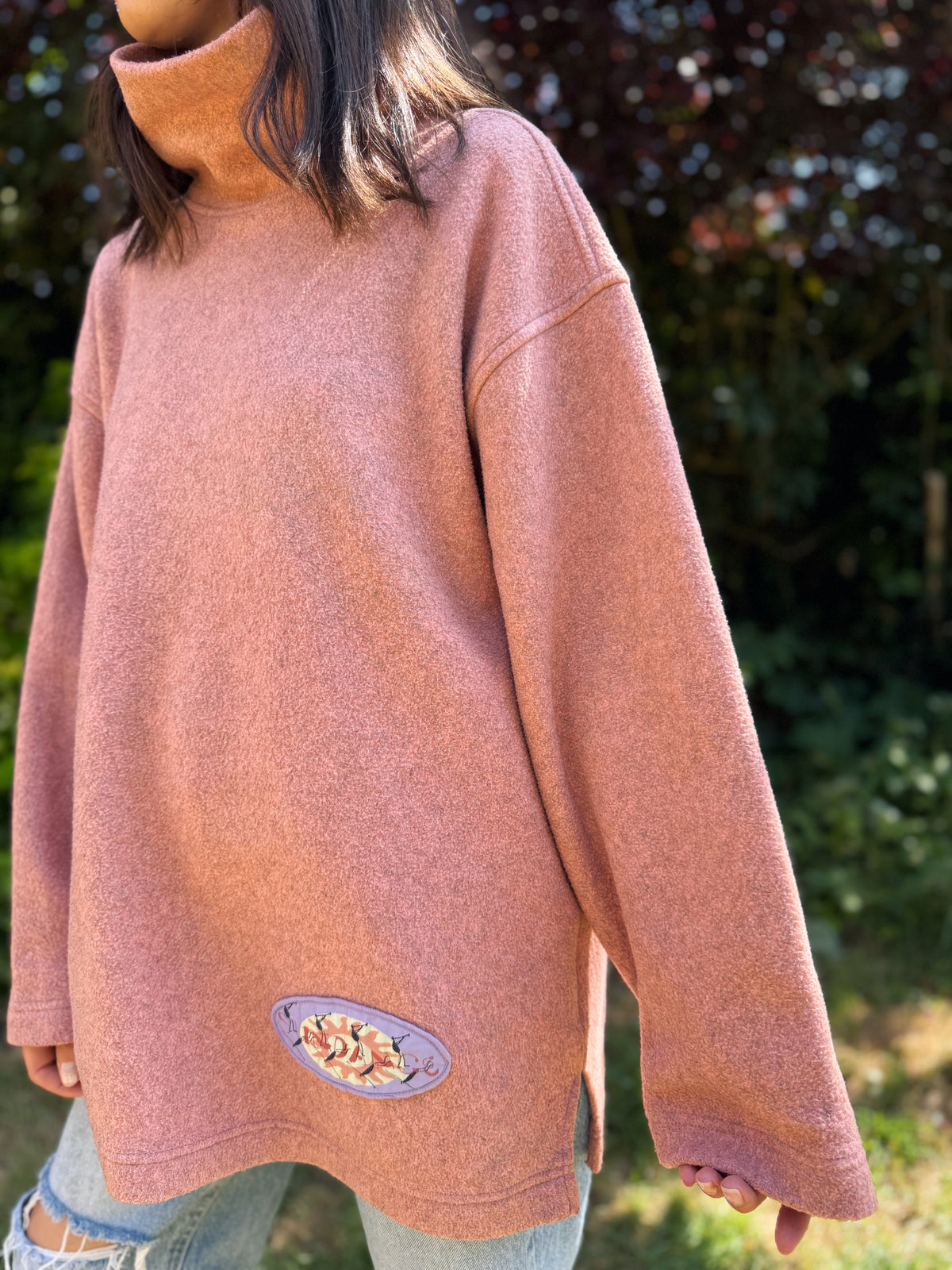 Vintage Embroidered Roll Neck Fleece Pullover with Sundance Sun Graphic in Dusty Rose